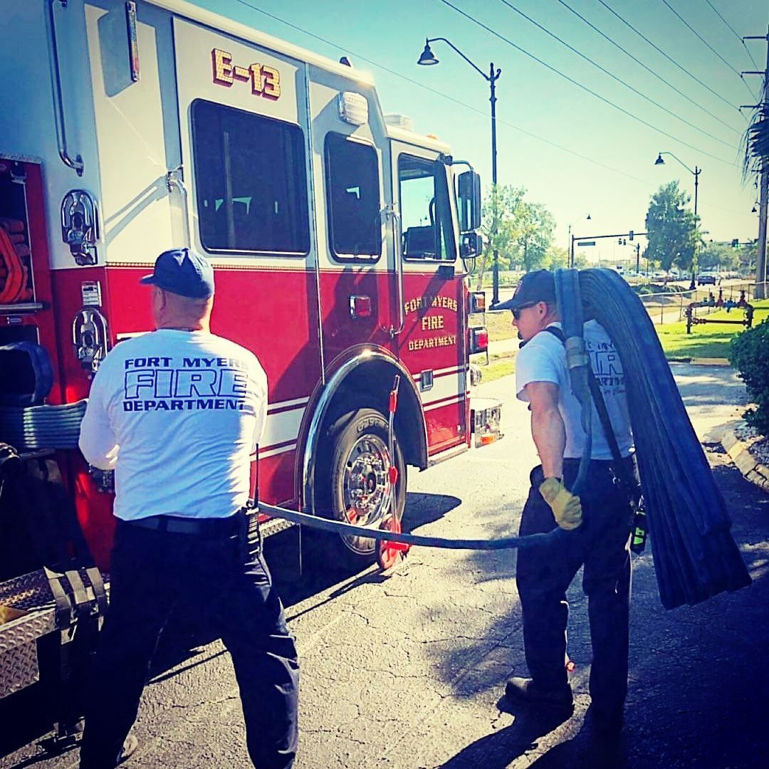 Fire Fighters With Hose